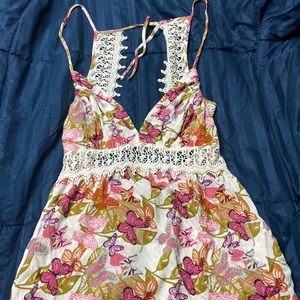 This is very cute almost completely backless